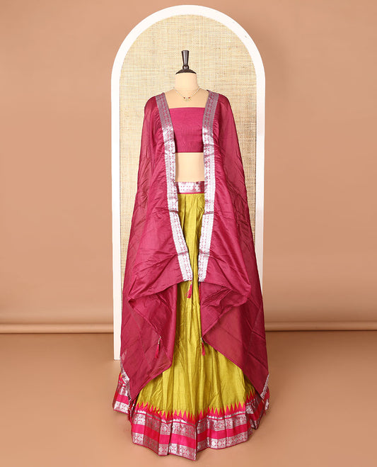 Green art-silk half-saree, plain with contrast temple traditional design bordered skirt, contrast blouse, and plain zari bordered dhavani