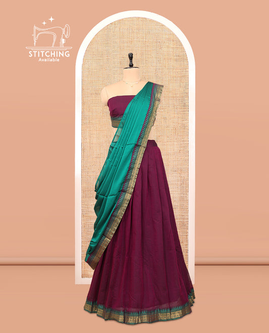 Purple Cotton Half-Saree Features Plain Skirt, a Contrast Temple Border, a Matching Blouse, and a Contrast Dhavani