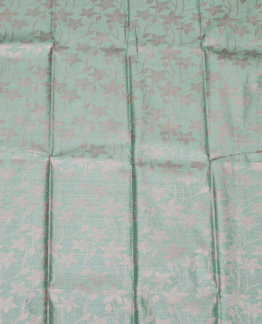 Green art silk pavadai set, floral jaal jacquard with traditional zari bordered skirt and a  matching blouse