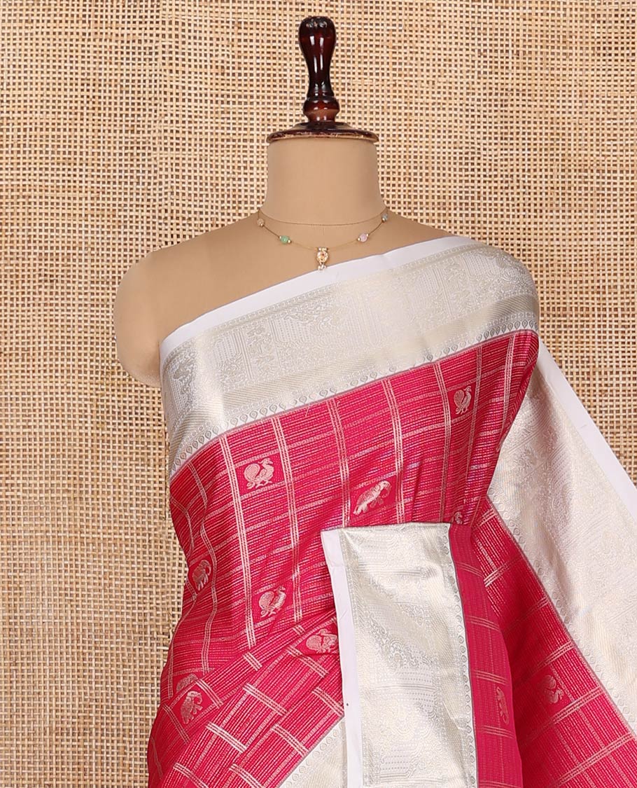 Pink Budget Silk Saree, Adorned with Peacock and Elephant Motif Enclosed Checks, Complemented by a Contrast Traditional Zari Designs Woven Border, Pallu of Jaal Designs, and Paired with a Contrast Blouse