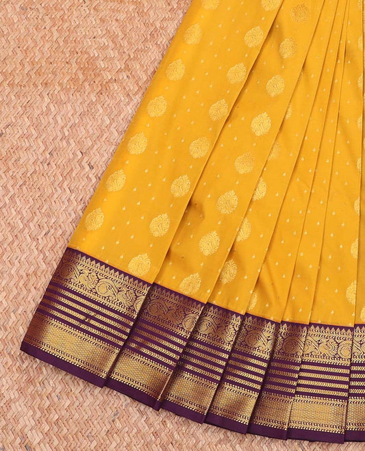 Yellow Budget Silk Saree, Adorned with Zari Buttas All Over Its Body, Complemented by a Contrast Traditional Zari Design Border, Grand Jaal Design Pallu, and Paired with a Contrast Blouse