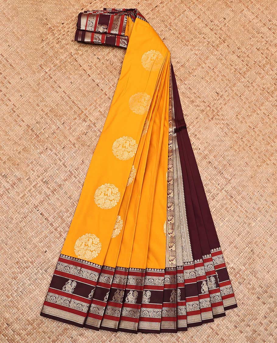 Yellow Budget Silk Saree, Adorned with Round Zari Buttas All Over Its Body, Complemented by Contrast Traditional Zari Designs Woven Border, Grand Jaal Pallu and Paired with a Contrast Blouse