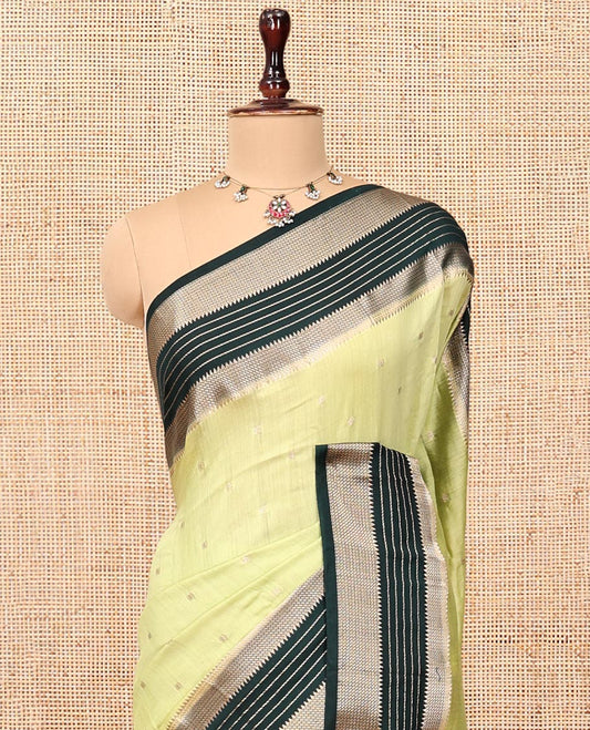 Light Green Assam Silk Saree, Sparsely Sparkled with Zari Buttas, Complemented by a Contrast Traditional Zari Border, Zari Design Pallu, and a Contrast Blouse