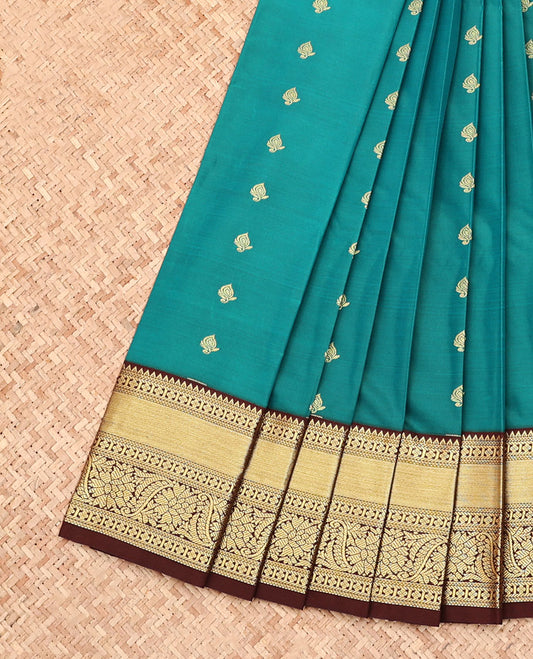 Green Budget Silk Saree, Adorned with Zari Buttas, Complemented by Contrast Traditional Zari Design Border, Floral Design Pallu, and a Contrast Blouse