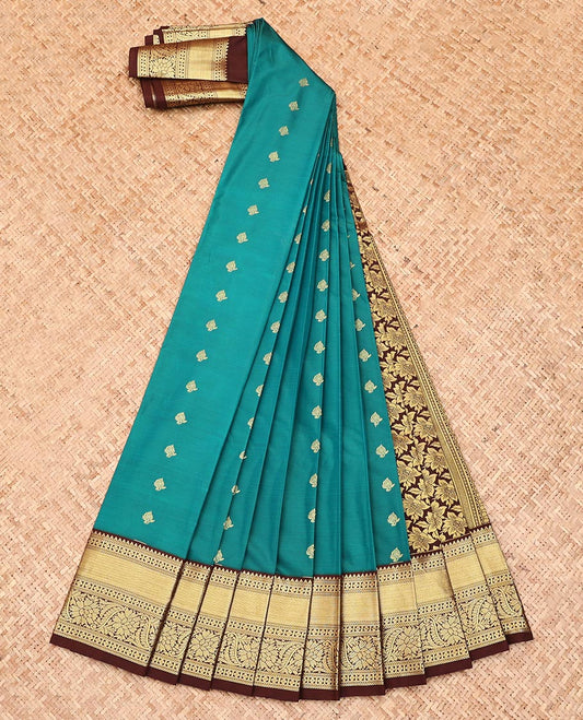 Green Budget Silk Saree, Adorned with Zari Buttas, Complemented by Contrast Traditional Zari Design Border, Floral Design Pallu, and a Contrast Blouse