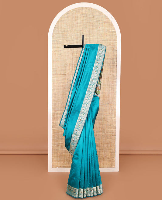 Blue plain kathan silk saree, floral creeper meenakari design border, and Mughal style floral design weave pallu
