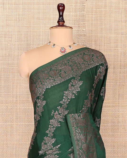 Green Fancy Crepe Saree, Majestically Detailed with Floral Creeper Jacquard, a Floral Border, an Intricately Designed Pallu, and a Matching Blouse