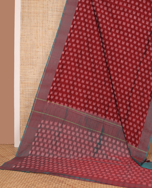 Maroon unique buttas woven ikkat cotton saree, contrast plain border, and pallu of buttas