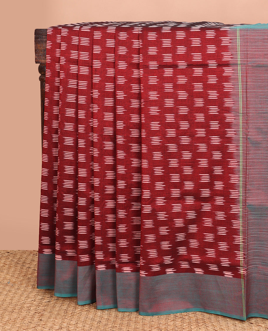 Maroon unique buttas woven ikkat cotton saree, contrast plain border, and pallu of buttas