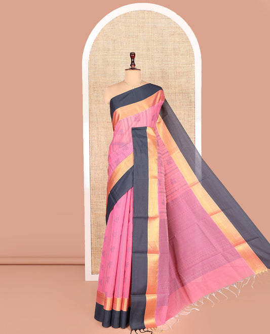Pink Semi-Silk Cotton Saree, Sparsely Woven with Floral and Stripes All Over Its Body, Complemented by Contrast Traditional Zari Design Border, Sparsely Jaal Pallu, and Paired with a Matching Blouse