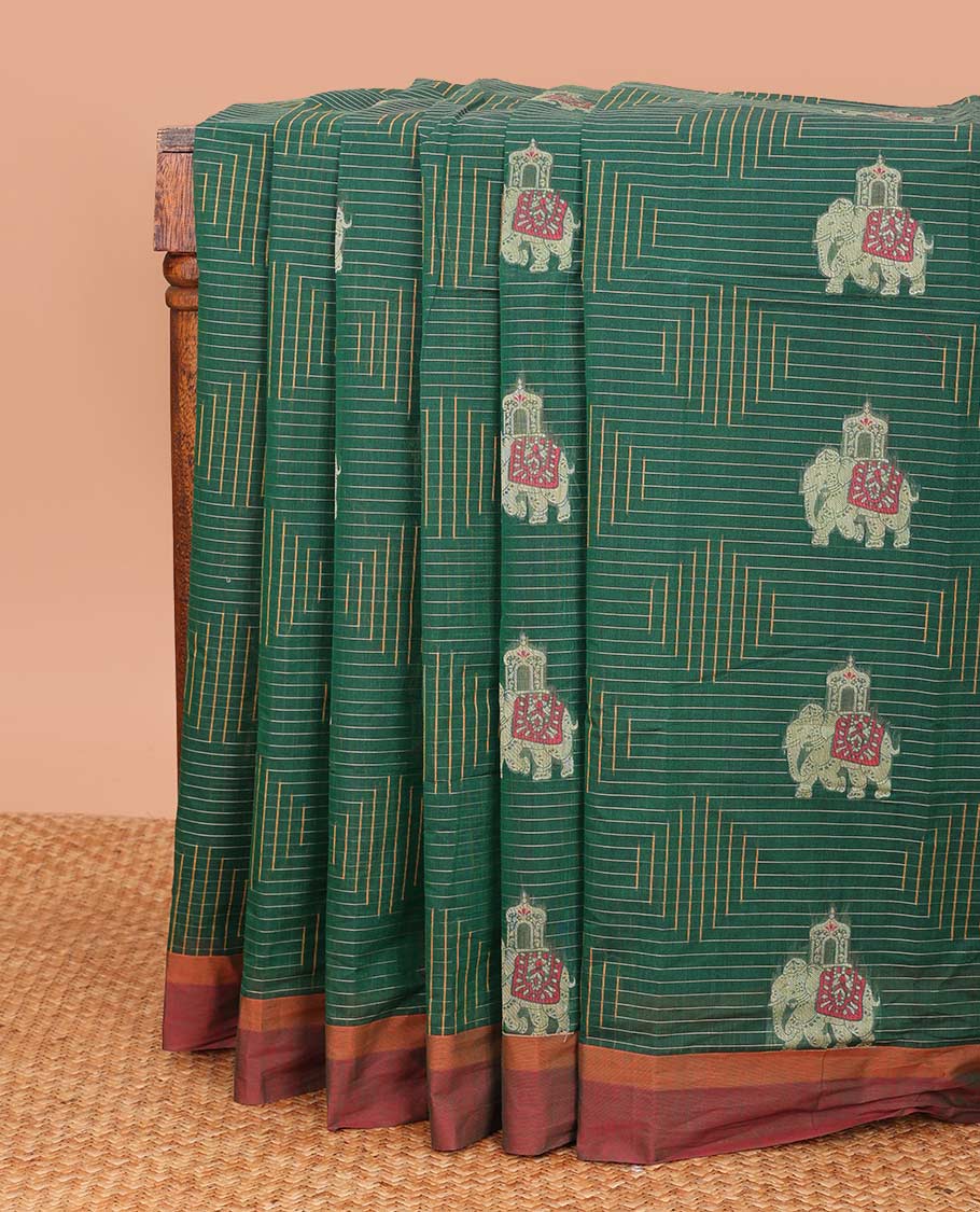 Green elephant motifs and geometric-patterned Coimbatore cotton saree, contrast border, and pallu of leaf and animal motifs print