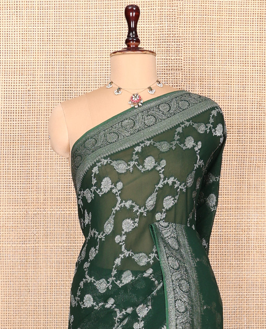 Green Georgette Saree, Adorned with Floral Jaal Jacquard, Highlighted by Floral Creeper Border, Grand Jaal Pallu, and  a Matching Blouse