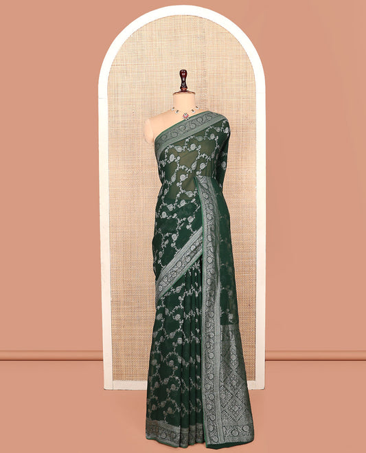 Green Georgette Saree, Adorned with Floral Jaal Jacquard, Highlighted by Floral Creeper Border, Grand Jaal Pallu, and  a Matching Blouse