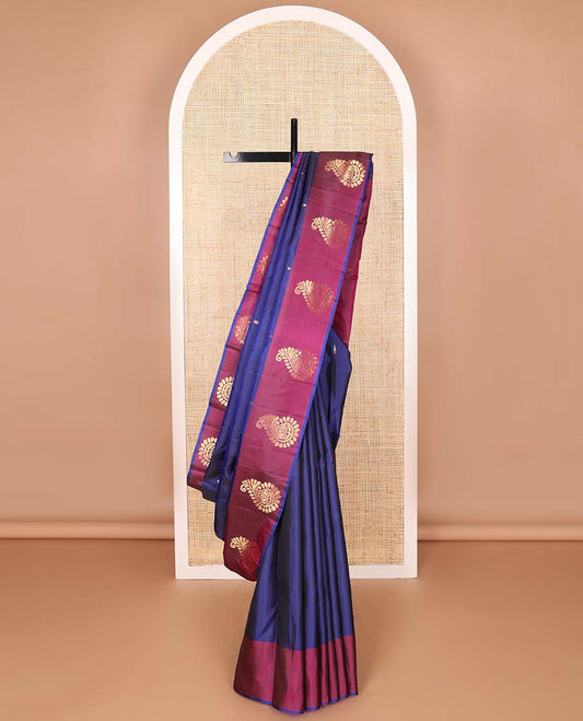 Dark blue buttas kancheepuram silk saree with contrast manga design border & floral design pallu