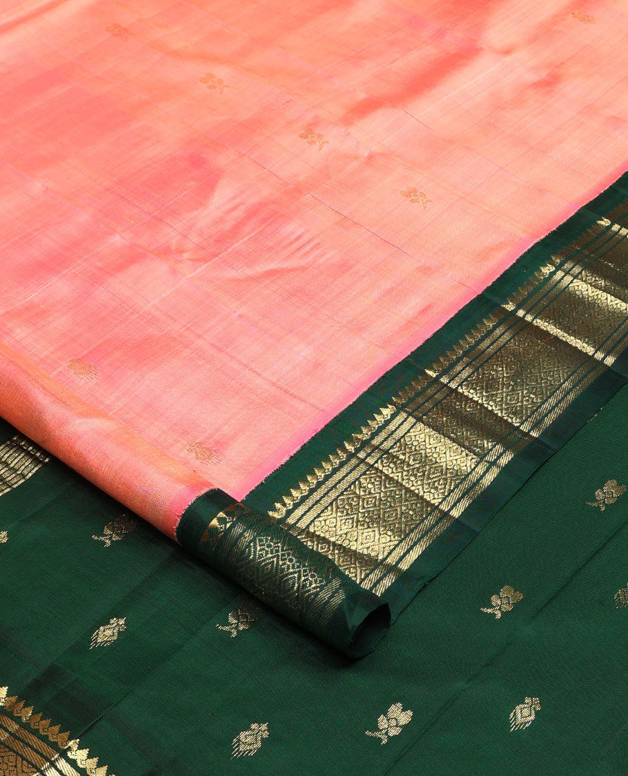 Peach zari buttas Kanchipuram silk saree, contrast korvai one-sided border of thilakam mokku, banaras, and jaal designs, and zari design pallu