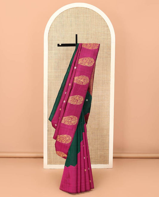 Borderless green and rani pink mayil chakram, and manga motifs Kanchipuram designer saree, zari-rich traditional designs pallu