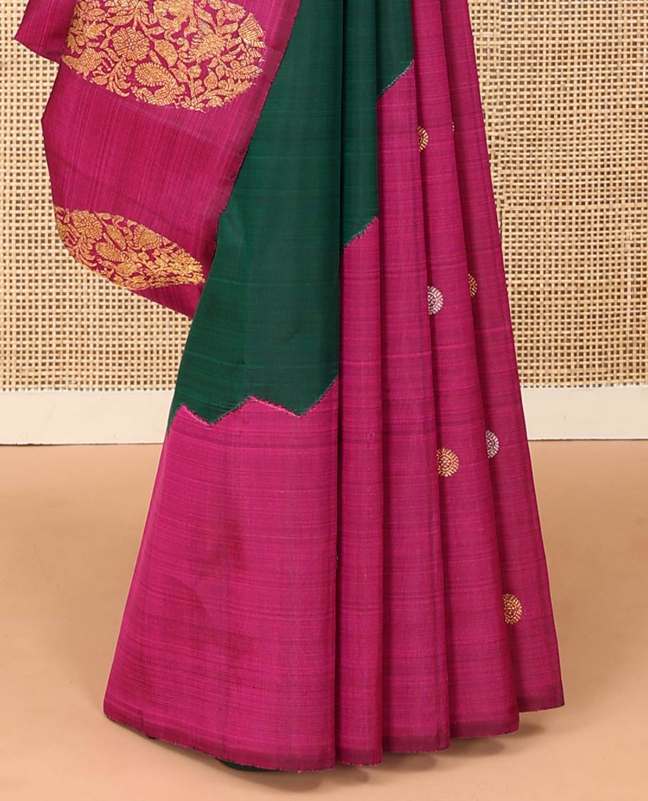 Borderless green and rani pink mayil chakram, and manga motifs Kanchipuram designer saree, zari-rich traditional designs pallu