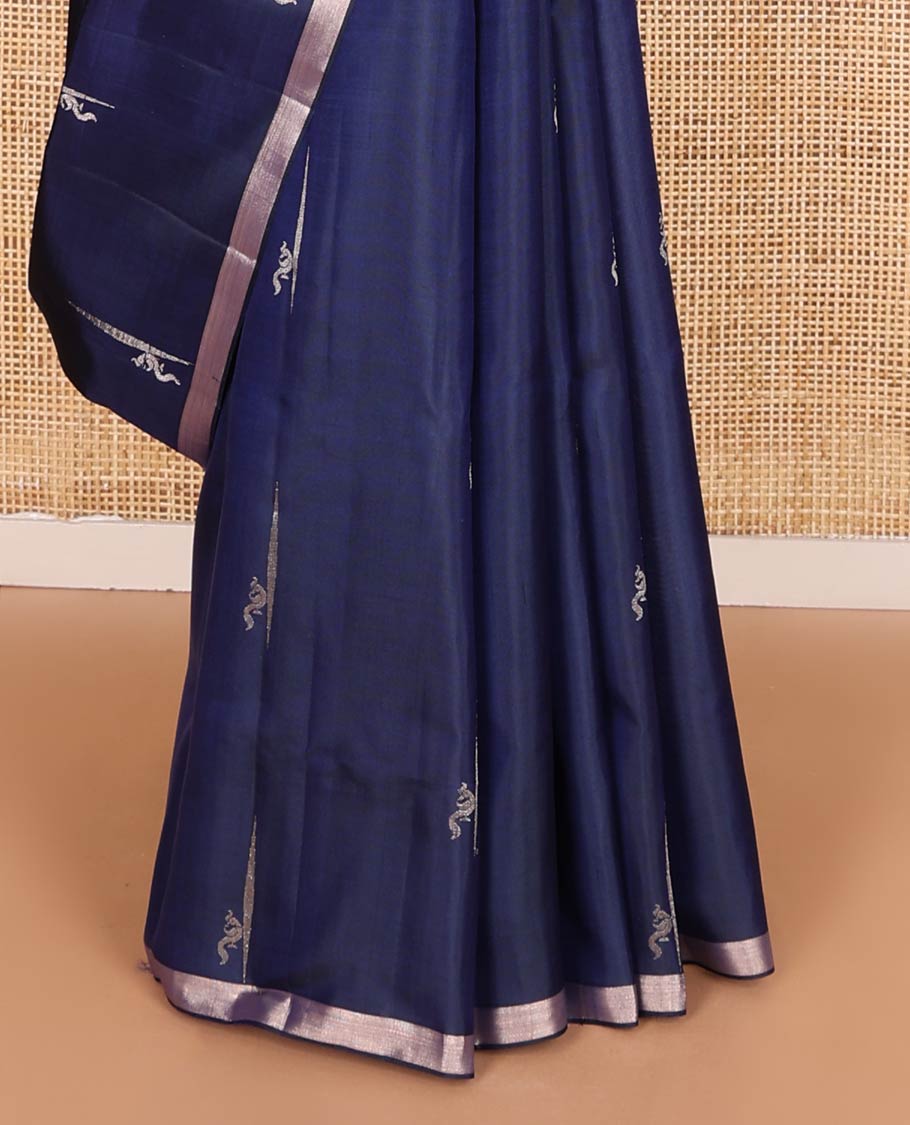 Navy blue zari buttas soft silk saree, thin piping border, and palllu of vanki designs