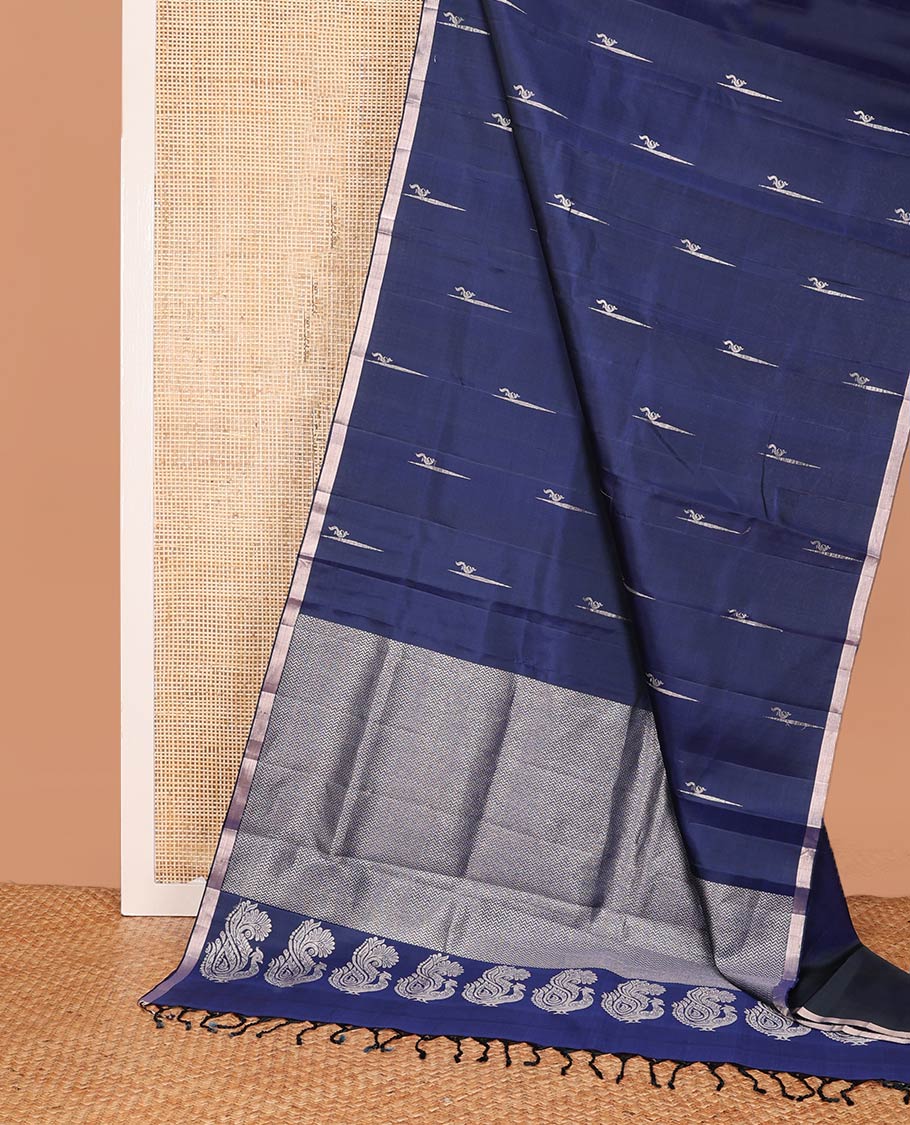 Navy blue zari buttas soft silk saree, thin piping border, and palllu of vanki designs