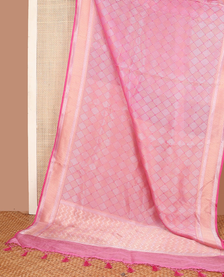 Pink jaal jacquard silk saree, geometric patterned border, and pallu of chevron design