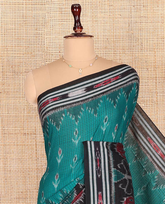 Blue Odisha Cotton Saree, Adorned with Buttas and Checks on Its Body, Complemented by a Contrast Border of Ikkat Weave Peacocks, Pallu of Ikkat Weave, and Comes Without a Blouse