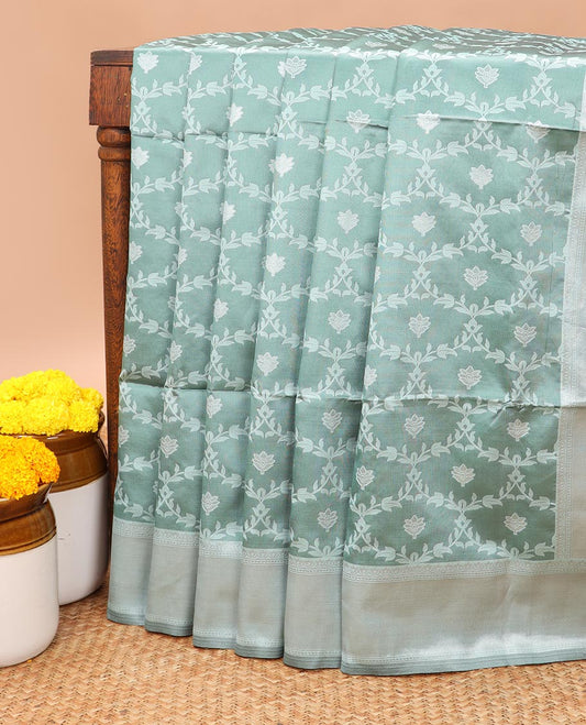 Light green  jaal design litchi soft silk saree with silver weaving border & silver zari rich pallu along with butta design blouse
