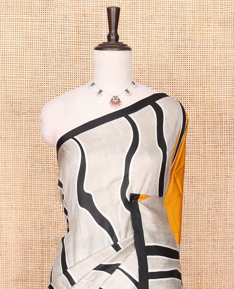 Grey Printed Silk Saree Featuring Free-Style Zig-Zag Stripes Running Vertically Through Its Body, Complemented with a Contrast Piping Border, Bright Pallu of Dual-Color Print, and Paired with a Contrast Plain Blouse
