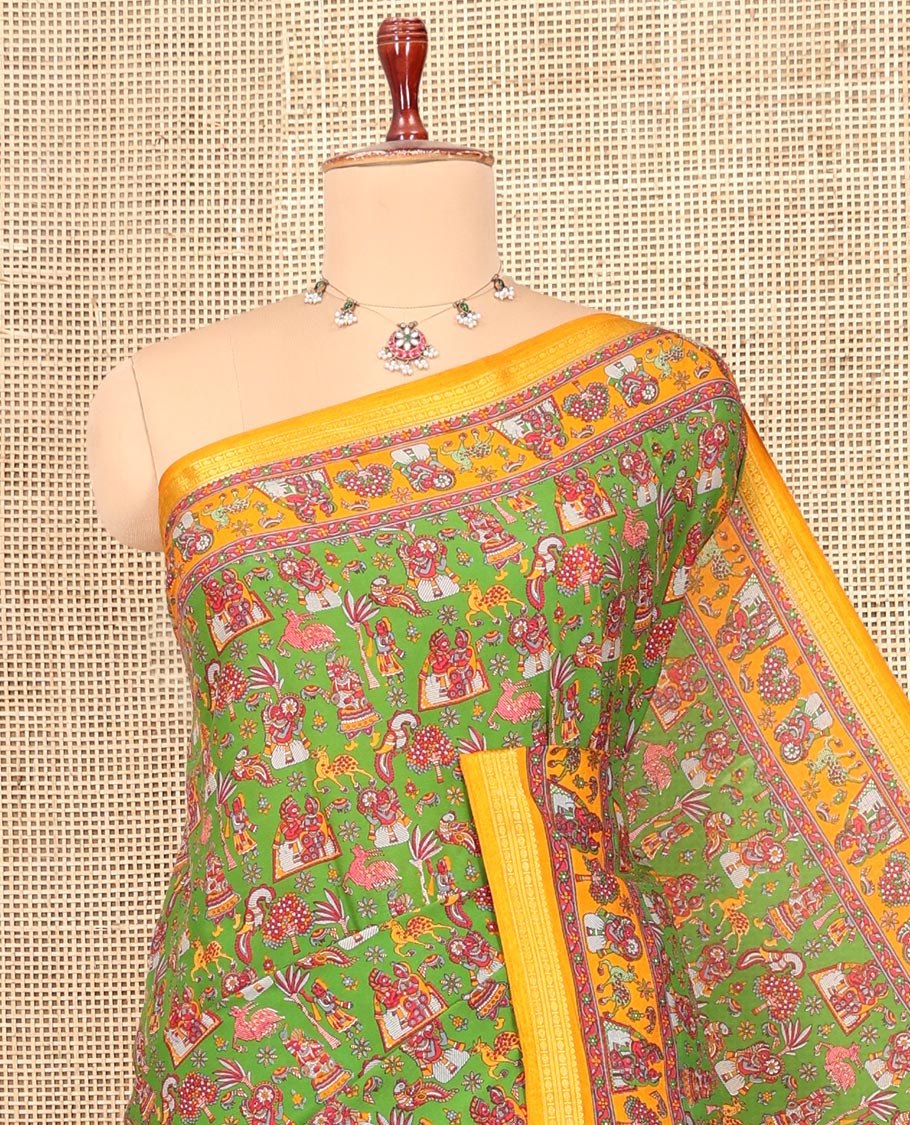 Green Printed Silk Saree, Adorned with a Village-Themed Print, a Contrast Traditional Zari Border, Striped Pallu, and a Contrast Blouse