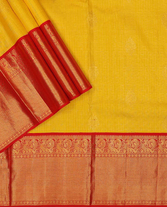 Yellow pure silk half-saree, zari design skirt, contrast korvai border of mayil, rudraksham, and mayil kann designs, and zari bordered blouse, and contrast jaal dhavani
