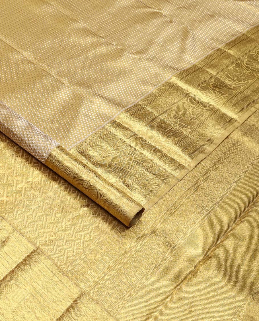 Gold jacquard Kanchipuram tissue silk saree, zari border of thilakam mokku, banaras, muthu, diamond, and kodi visiry designs, and jaal pallu