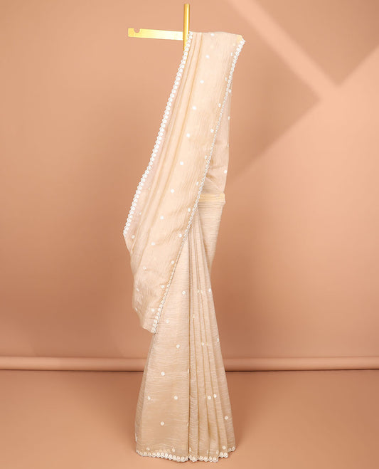 Beige floral thread embroidery tissue saree with floral scallop thread embroidery border