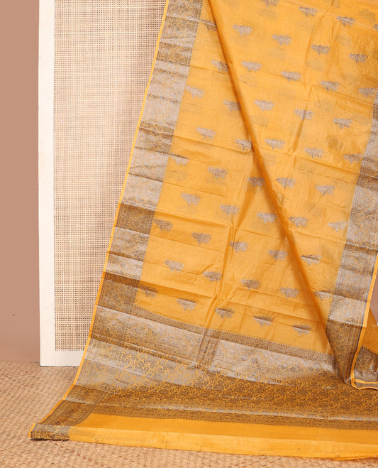 Yellow tussar saree with floral zari buttas, floral design zari border & floral jaal pallu