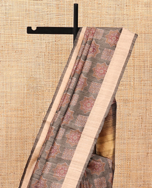Brown Tussar Silk Saree, Artfully Detailed with Ajrakh-Style Motifs Block Print, a Subtle Border, a Heathered Pallu, and a Matching Blouse
