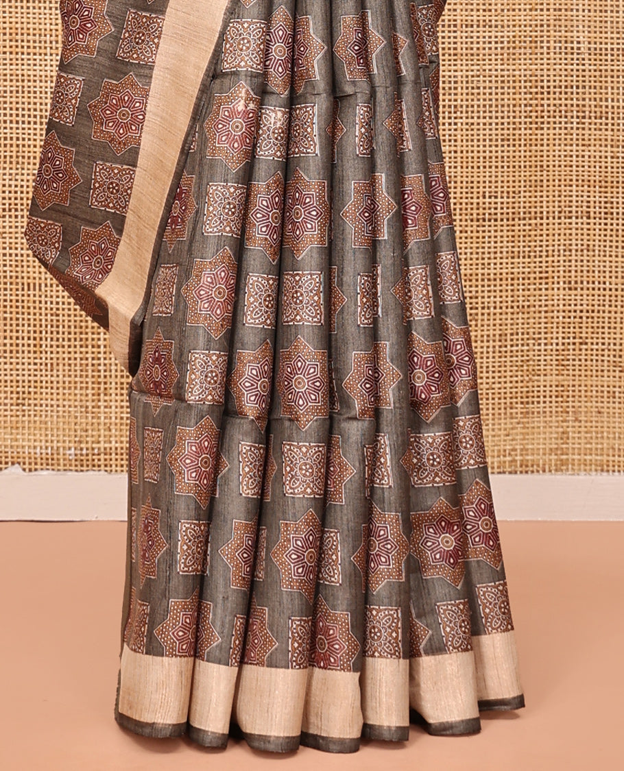 Brown Tussar Silk Saree, Artfully Detailed with Ajrakh-Style Motifs Block Print, a Subtle Border, a Heathered Pallu, and a Matching Blouse