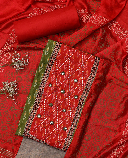 Green material chudidar set, ikkat buttas with neck patch embroidered top, contrast plain bottom, and block printed dupatta