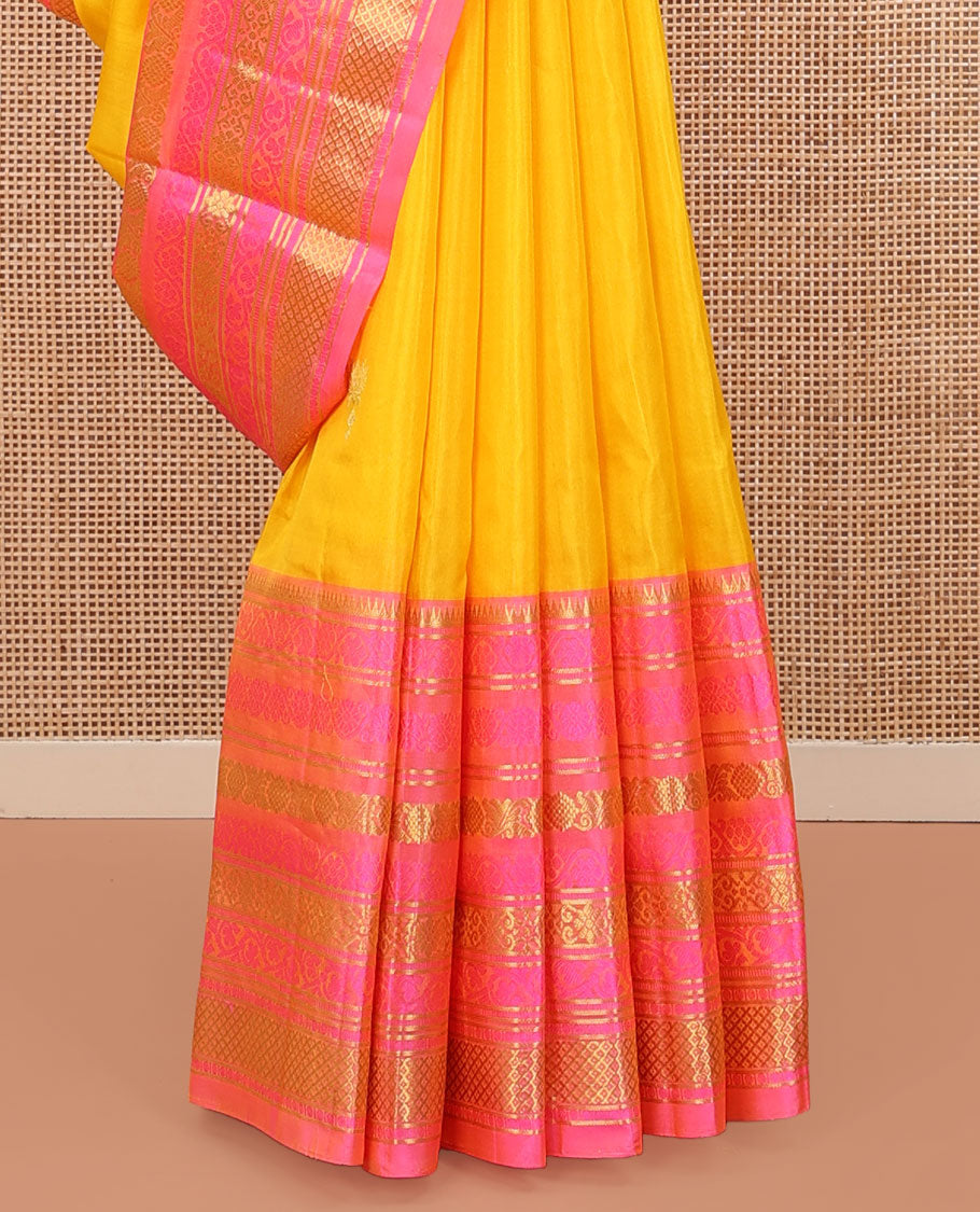 Yellow Venkatagiri Silk Saree, Sparsely Woven with Zari Buttas All Over Its Body, Complemented by a Contrast Border of Temple, Floral, and Peacock-Eye Designs, Pallu of Peacock Eye Designs, and Paired with a Contrast Blouse