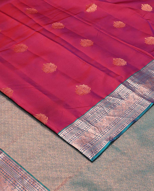 Red zari buttas Vasundhara silk mix saree, contrast border of thilakam mokku, banaras, poun, neli, and mayil design, and zari-rich jaal pallu
