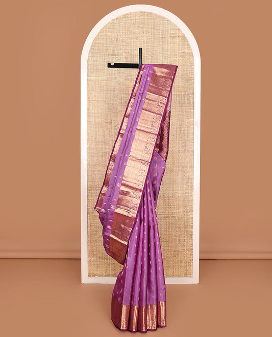 Pink Vasundhara Lite-Silk Mix Saree Embellished with Zari Buttas, Complemented with a Contrast Border Featuring Thilakam, Muthu, Neli, Jaal, Kamalam, and Kodi Visiry Designs, Elevated with Pallu of Intricate Designs, and a Contrast Blouse