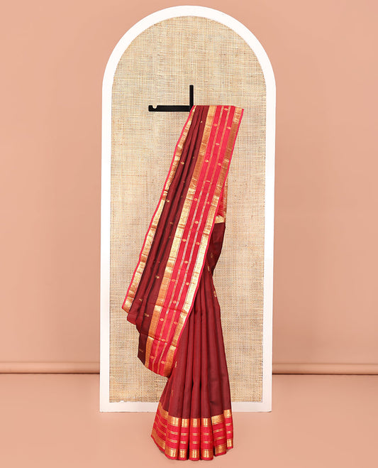 Maroon Vasundhara Lite Silk Mix Saree, Decked Up with Zari Buttas All Over Its Body, Complemented by a Contrast Border of Rekku, Muthu, and Diamond Designs, Grand Jaal-Design Pallu, and Paired with a Contrast Blouse