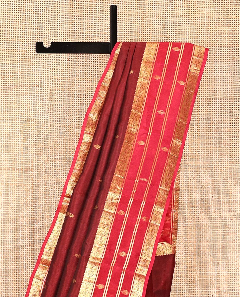 Maroon Vasundhara Lite Silk Mix Saree, Decked Up with Zari Buttas All Over Its Body, Complemented by a Contrast Border of Rekku, Muthu, and Diamond Designs, Grand Jaal-Design Pallu, and Paired with a Contrast Blouse