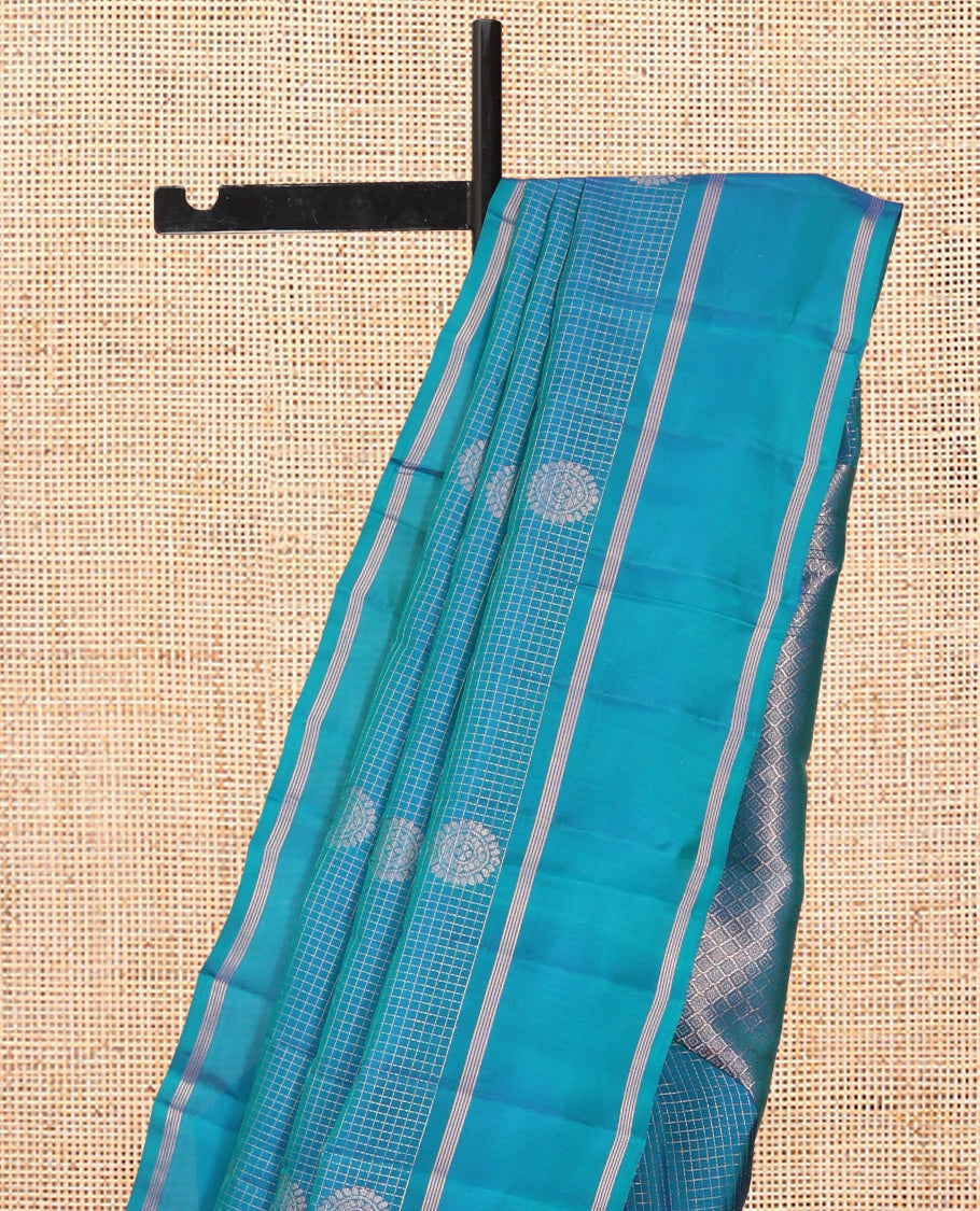 Blue Vasundhara Lite Silk Mix Saree, Adorned with Mayil Buttas and Checks, a Bodi Border, Grand Jaal Pallu, and a Matching Blouse