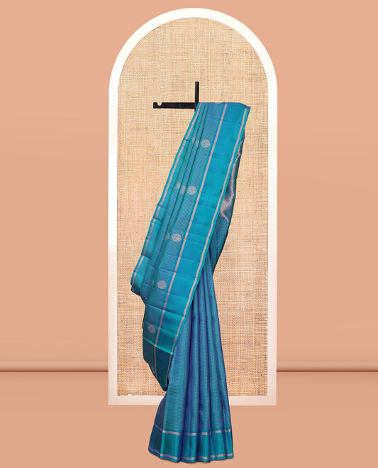 Blue Vasundhara Lite Silk Mix Saree, Adorned with Mayil Buttas and Checks, a Bodi Border, Grand Jaal Pallu, and a Matching Blouse