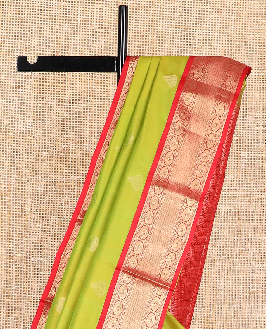 Green leaf buttas silk saree with contrast border of banaras, kathir, paun design & geometric design pallu