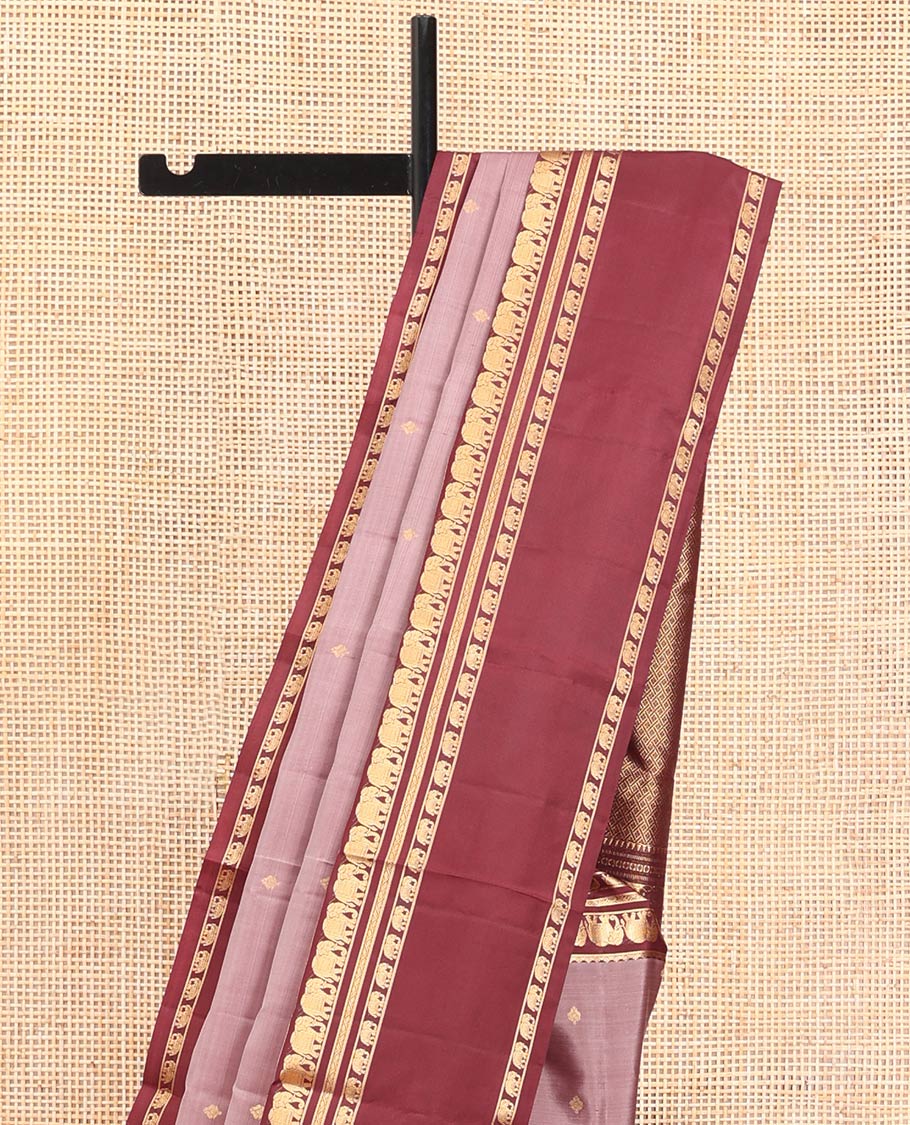 Grey Vasundhara Silk Saree, Adorned with Zari Buttas All Over Its Body, Complemented by a Contrast Rettai Pettu Border of Yaanai Designs, Grand Jaal Pallu, and Paired with a Contrast Blouse