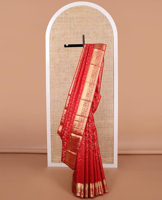 Red floral jacquard kancheepuram silk saree with self border of thilakam mokku, muthu, banaras design & floral pallu