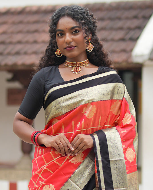 Reddish Orange Budget Silk Saree, Adorned with Jhumka Butta Enclosed Checks, Contrast Traditional Zari Rettai Pettu Border, Grand Pallu, and a Contrast Blouse