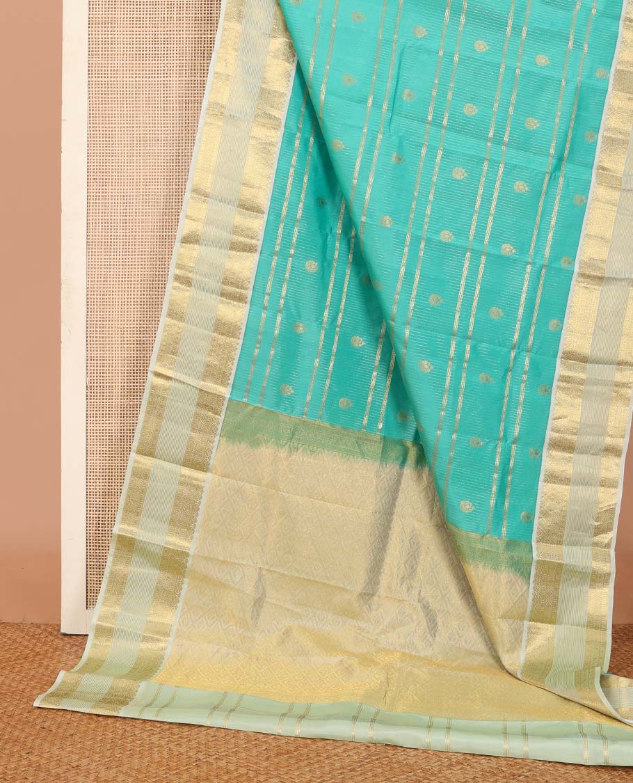 Turquoise blue zari design silk saree, contrast traditional motifs steeped zari border, and zari-rich jaal pallu