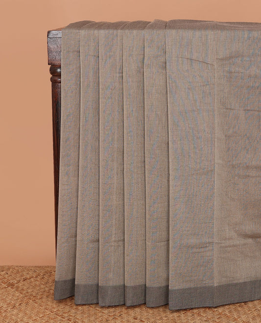 Brown sparesly striped Mangalagiri Cotton saree, contrast plain border, and contrast Pichwai cow printed blouse