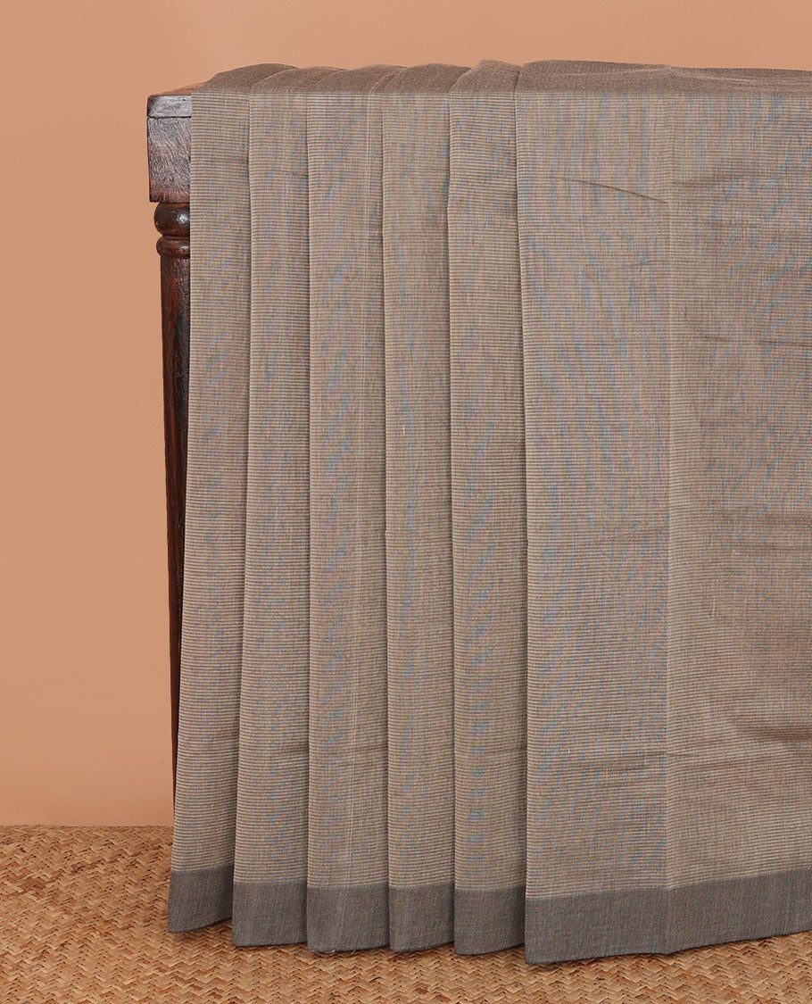 Brown sparesly striped Mangalagiri Cotton saree, contrast plain border, and contrast Pichwai cow printed blouse