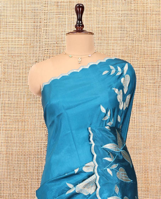 Peacock Blue Dupion Silk Saree, Delicately Decked Up with Floral-Leaf Vine Embroidered On Its Body, Subtle Scallop Border, Artfully Floral Embroidered Pallu, and Paired with a Plain Blouse
